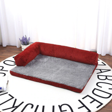 canapé rouge pour chien en forme de L